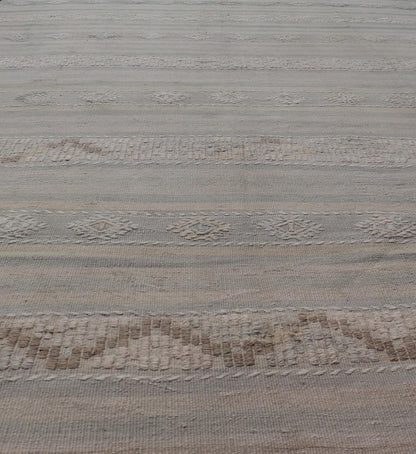 Measures: 6'6 x 10'0 
 
 Turkish Flat-Weave in Tan, Taupe, and Gray-Blue with Stripes and Embroideries. Keivan Woven Arts / Rug EN-15176, country of origin / type: Turkey / Kilim, circa 1950.
 
 
 
 This vintage Turkish Kilim rug features a contemporar...