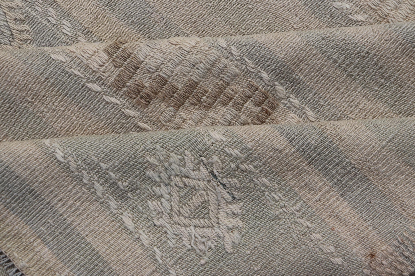 Measures: 6'6 x 10'0 
 
 Turkish Flat-Weave in Tan, Taupe, and Gray-Blue with Stripes and Embroideries. Keivan Woven Arts / Rug EN-15176, country of origin / type: Turkey / Kilim, circa 1950.
 
 
 
 This vintage Turkish Kilim rug features a contemporar...