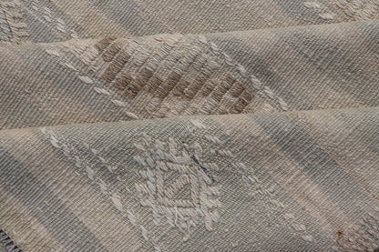 Measures: 6'6 x 10'0 
 
 Turkish Flat-Weave in Tan, Taupe, and Gray-Blue with Stripes and Embroideries. Keivan Woven Arts / Rug EN-15176, country of origin / type: Turkey / Kilim, circa 1950.
 
 
 
 This vintage Turkish Kilim rug features a contemporar...
