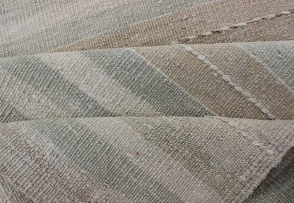 Vintage Turkish Kilim Runner with a Stripe and Modern Design in Neutral Tones
 
 
 
 Vintage Turkish Kilim runner with a stripe and modern design, Minimalist stripe design Kilim runner from Turkey. Keivan Woven Arts / rug EN-176929, country of origin /...