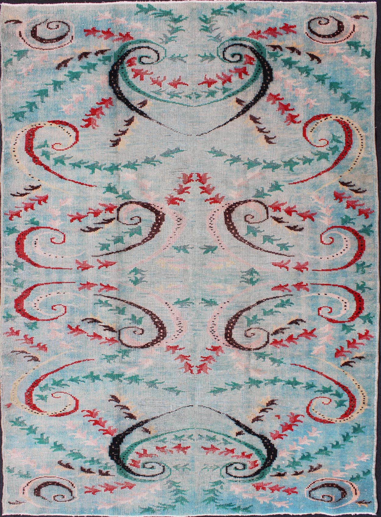 Mid-Century Modern Turkish Rug-This Mid-Century Modern rug is set on light blue background. The vine scroll motifs portray movement in this very unique rug. 6`3 x 9`1