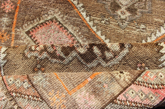 Vintage Turkish Oushak Runner with Tribal Medallions in Earthy Tones
 
 
 
  Vintage Turkish Oushak runner with floral medallions, Keivan Woven Arts / rug en-140350, country of origin / type: Turkey / Oushak, circa 1940.
 
 
 
 This vintage Oushak runn...