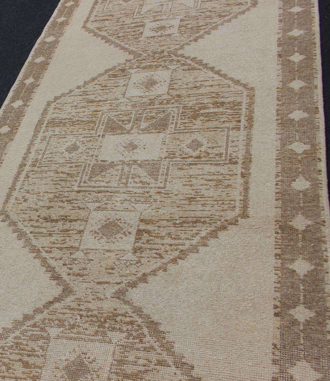 Vintage Turkish Oushak Wide Runner With Three Geometric Medallions in Neutral Colors. 
 
 
 
  Midcentury vintage Turkish Oushak runner with three flowing medallions, rug/TU-ALK-3573, country of origin / type: Turkey / Oushak, circa mid-20th century.
 ...