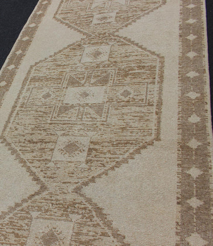 Vintage Turkish Oushak Wide Runner With Three Geometric Medallions in Neutral Colors. 
 
 
 
  Midcentury vintage Turkish Oushak runner with three flowing medallions, rug/TU-ALK-3573, country of origin / type: Turkey / Oushak, circa mid-20th century.
 ...