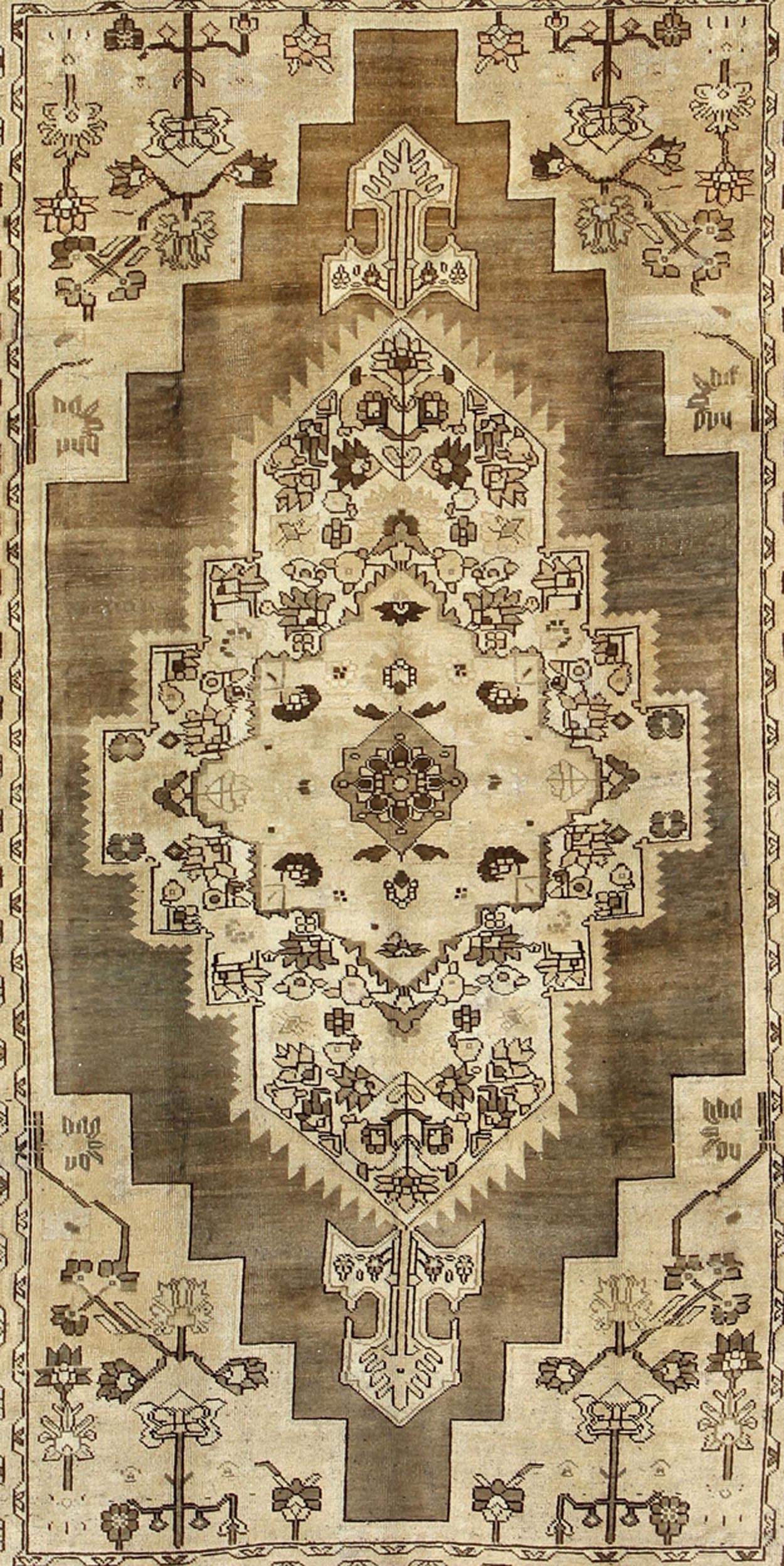 Turkish Oushak Rug with Layered Sub-Geometric Vintage in Shades of Brown & Cream kwarugs
 
 
 
 Layered medallion sub-geometric vintage Turkish Oushak rug in shades of brown and cream, rug tu-vey-3284, country of origin / type: Turkey / Oushak, circa 1...