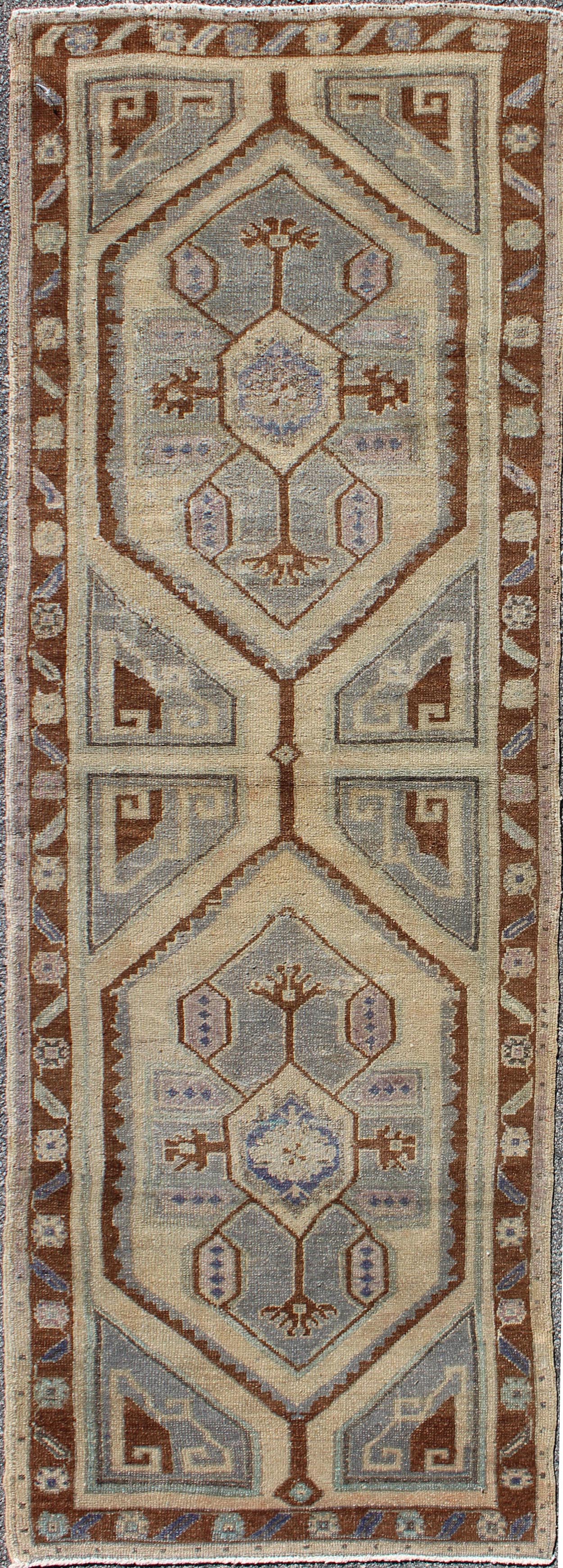 Vintage Turkish Oushak runner with two medallions in nude, blue-gray, red-brown, rug tu-vey-3290, country of origin / type: Turkey / Oushak, circa 1940
 
 
 
 This vintage Turkish Oushak carpet (circa mid-20th century) features a tribal, central dual-m...