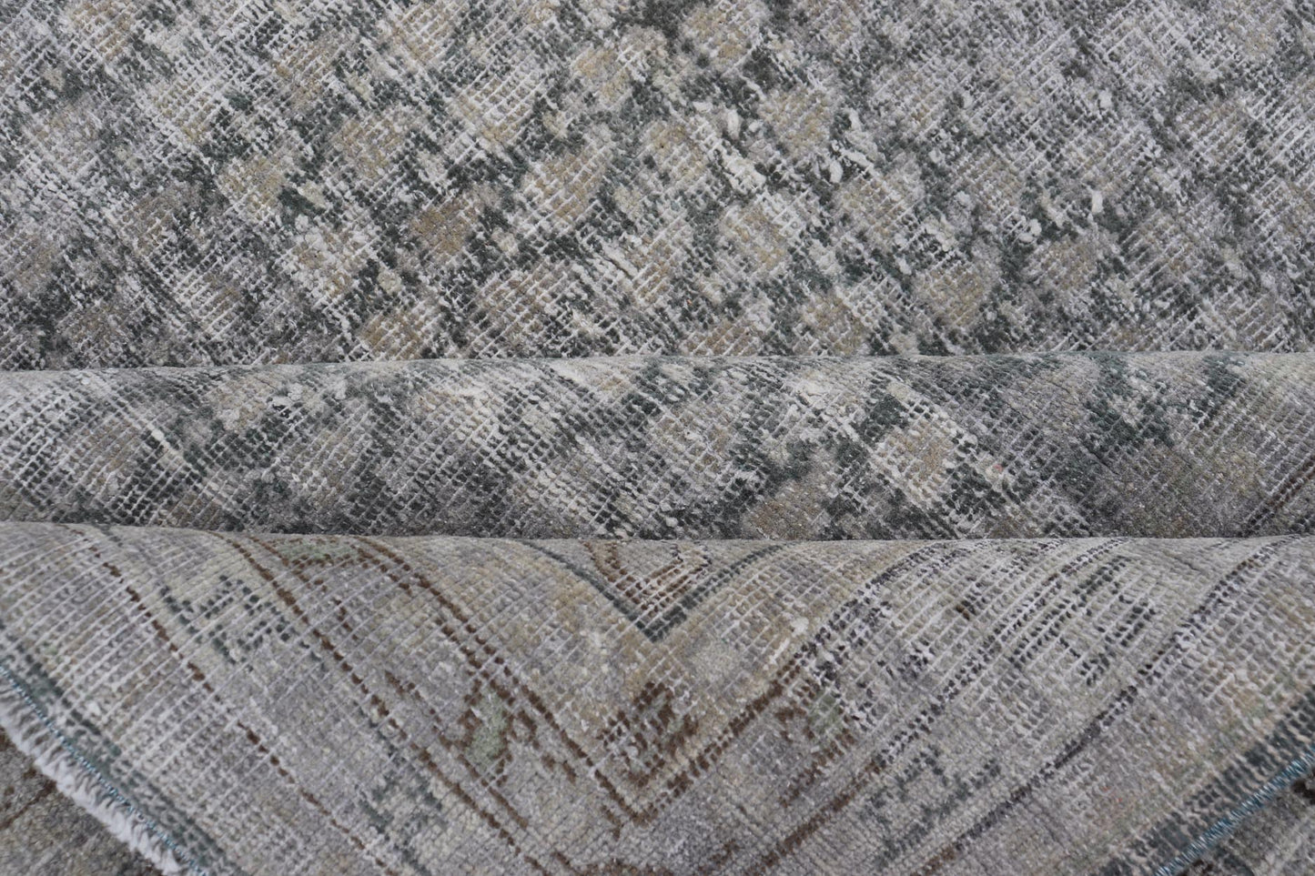 Measures: 8'0 x 11'2 
 
 Distressed Persian Antique Tabriz Carpet with Muted Floral Design in Light Gray Keivan Woven Arts/ rug EMB-22115-15112, country of origin / type: Iran/ Tabriz, circa 1920.
 
 This muted antique distressed Persian Tabriz carpet ...