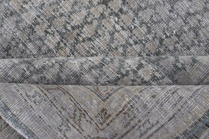 Measures: 8'0 x 11'2 
 
 Distressed Persian Antique Tabriz Carpet with Muted Floral Design in Light Gray Keivan Woven Arts/ rug EMB-22115-15112, country of origin / type: Iran/ Tabriz, circa 1920.
 
 This muted antique distressed Persian Tabriz carpet ...