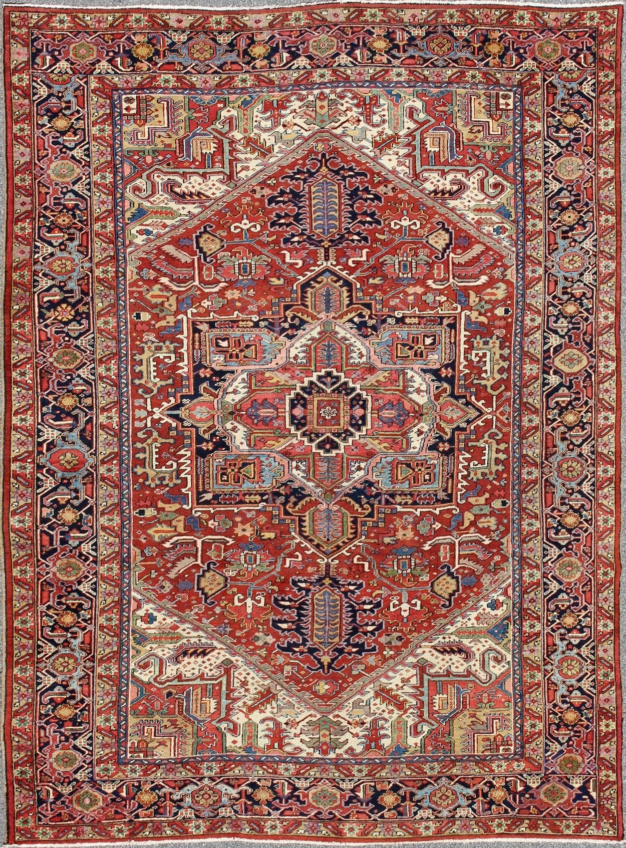 Antique Heriz - Serapi Rug with Geometric Medallion in Rust Red, Dark Blue, Green. Keivan Woven Arts / Rug / A - 0203, country of origin / type: Iran /Heriz, circa 1900. Measures: 10'3 x 13'3. This magnificent antique Persian Heriz - Serapi carpet fro... - Keivan Woven ArtsA - 0203 - 201Rug