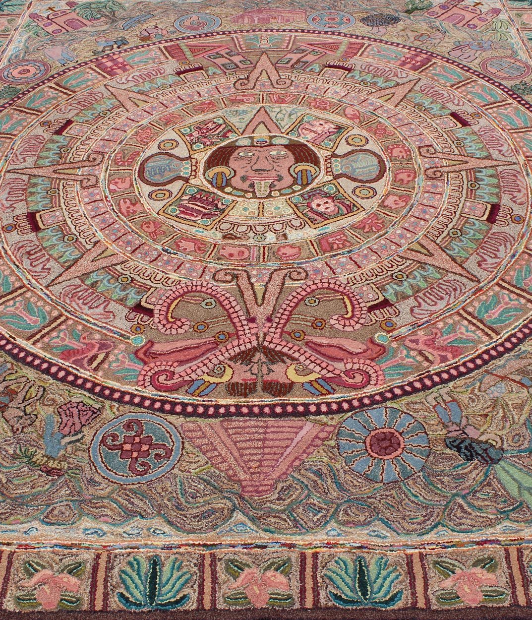 Vintage Large American Hook Rug This very unusual American hook rug features an Aztec calendar design in the center and figures from Chichen Itza, Mayan Ruins, and life in the countryside in Central and South America. Measures: 8'1 x 10'4. - Keivan Woven ArtsA - 0205 - 213