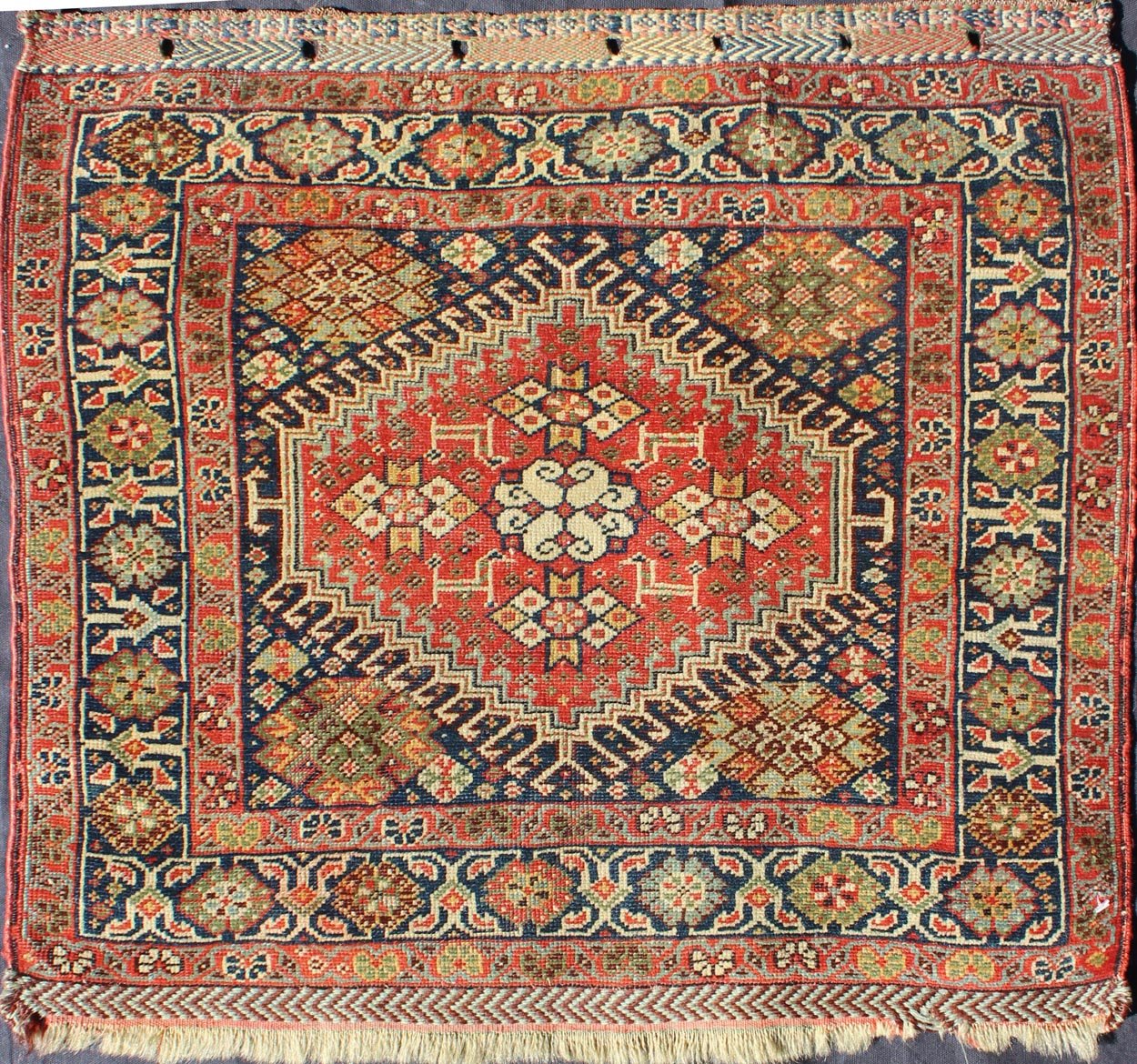 Red and Black Antique Persian Shahsavan Rug with Hexagon Latch Hook Medallion, rug a - 0406, country of origin / type: Iran / Shahsavan, circa 1870. This antique Shahsavan rug from late - nineteenth century Persian features a hexagon medallion in it... - Keivan Woven ArtsA - 0406 - 1185Rug