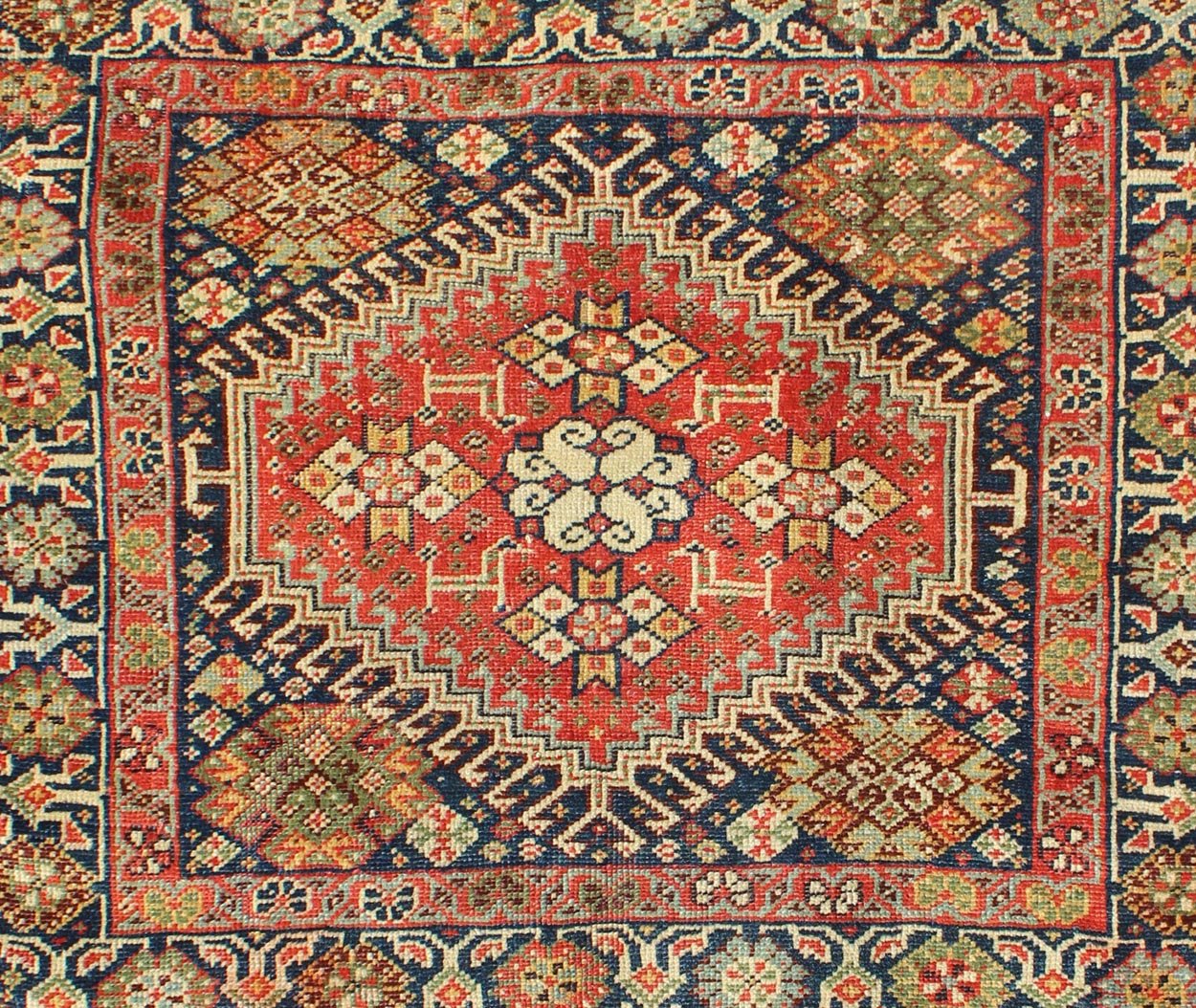 Red and Black Antique Persian Shahsavan Rug with Hexagon Latch Hook Medallion, rug a - 0406, country of origin / type: Iran / Shahsavan, circa 1870. This antique Shahsavan rug from late - nineteenth century Persian features a hexagon medallion in it... - Keivan Woven ArtsA - 0406 - 1185Rug