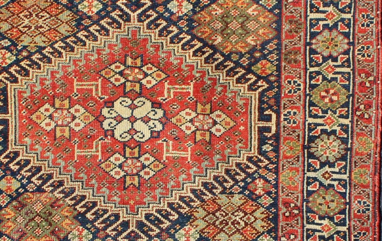 Red and Black Antique Persian Shahsavan Rug with Hexagon Latch Hook Medallion, rug a - 0406, country of origin / type: Iran / Shahsavan, circa 1870. This antique Shahsavan rug from late - nineteenth century Persian features a hexagon medallion in it... - Keivan Woven ArtsA - 0406 - 1185Rug