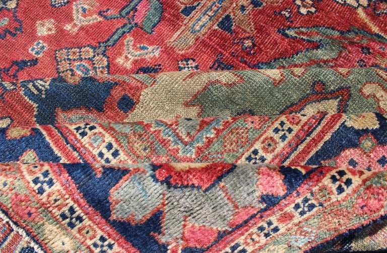 Antique Persian Sultanabad Rug in Red, Blue, Green and Large Scale Florals Late 19th century Antique Persian Sultanabad rug, Keivan Woven Arts/ Rug A - 1203, country of origin / type: Persian / Sultanabad, circa early - 20th century. Measu... - Keivan Woven ArtsA - 1203 - 609Rug