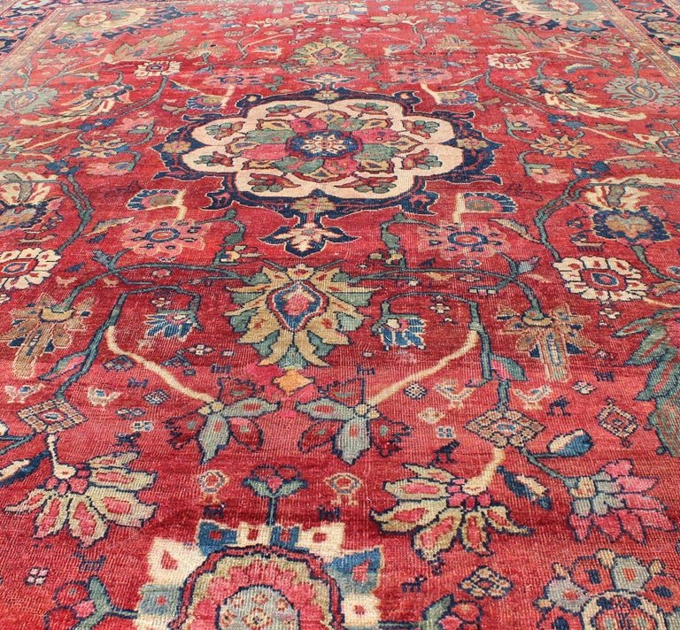 Antique Persian Sultanabad Rug in Red, Blue, Green and Large Scale Florals Late 19th century Antique Persian Sultanabad rug, Keivan Woven Arts/ Rug A - 1203, country of origin / type: Persian / Sultanabad, circa early - 20th century. Measu... - Keivan Woven ArtsA - 1203 - 609Rug
