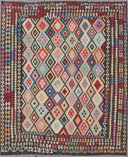 Colorful Tribal Kilim Flat Weave Rug with Chocolate Brown & Bright Multi Colors This flat - woven kilim rug from Afghanistan features a bold geometric design consisting of a variety of colors, including brown, purple, light green, teal, yellow, gr... - Keivan Woven ArtsABT - 8120937 - 8467Rug