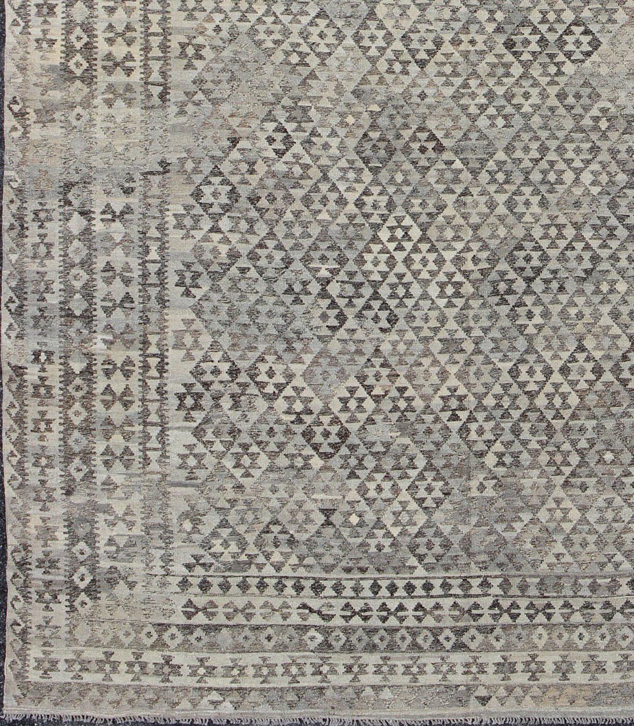 Large Tribal modern Kilim in Charcoal, silver, Brown, Silver Blue and Gray. Measures: 10' x 13'. This gorgeous Kilim from Afghanistan features a modern look, rendered in a small scale geometric diamond design enclosed within a border of r... - Keivan Woven ArtsABT - 8132869 - 8485Rug