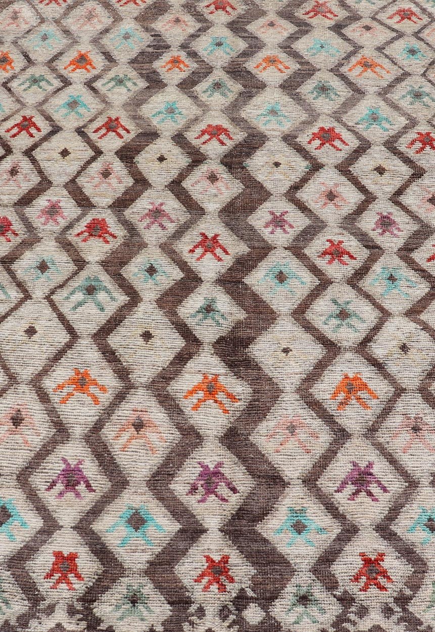 Modern Hand - Knotted Rug in Wool with Sub - Geometric Diamond Design in Multicolor This modern casual tribal rug has been hand - knotted. The rug features a modern all - over sub - geometric diamond design, replete with various motifs in multicolor, mak... - Keivan Woven ArtsAFG - 004 - 563Rug