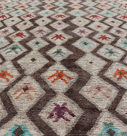 Modern Hand - Knotted Rug in Wool with Sub - Geometric Diamond Design in Multicolor This modern casual tribal rug has been hand - knotted. The rug features a modern all - over sub - geometric diamond design, replete with various motifs in multicolor, mak... - Keivan Woven ArtsAFG - 004 - 563Rug