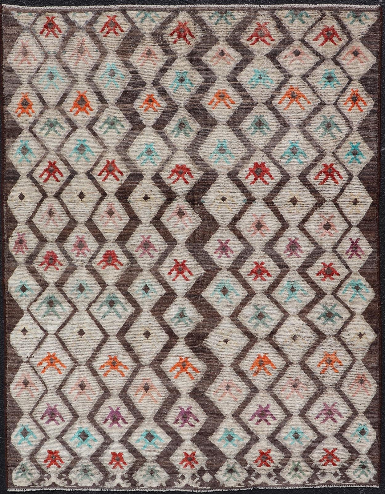 Modern Hand - Knotted Rug in Wool with Sub - Geometric Diamond Design in Multicolor This modern casual tribal rug has been hand - knotted. The rug features a modern all - over sub - geometric diamond design, replete with various motifs in multicolor, mak... - Keivan Woven ArtsAFG - 004 - 563Rug