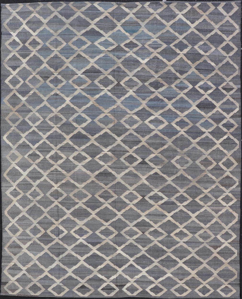 Modern Hand - Woven Kilim in Wool with Sub - Geometric Interlocked Diamond Design This modern flat - weave kilim has been hand - woven. The rug features a modern sub - geometric interlocked diamond design, rendered in blues, grays and cream; making this r... - Keivan Woven ArtsAFG - 037 - 19664