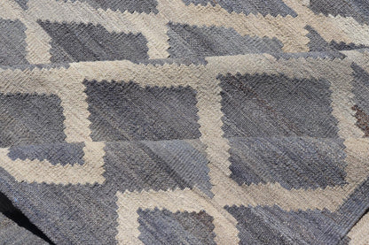 Modern Hand - Woven Kilim in Wool with Sub - Geometric Interlocked Diamond Design This modern flat - weave kilim has been hand - woven. The rug features a modern sub - geometric interlocked diamond design, rendered in blues, grays and cream; making this r... - Keivan Woven ArtsAFG - 037 - 19664Rug