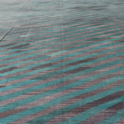 Modern Afghan Hand - Woven Kilim in Wool with Sub - Geometric Slanted Stripe Design This flat - weave kilim has been hand - woven. The rug features a modern slanted stripe design, rendered in green and shades of gray; making this rug a superb fit for a... - Keivan Woven ArtsAFG - 044 - 19676Rug