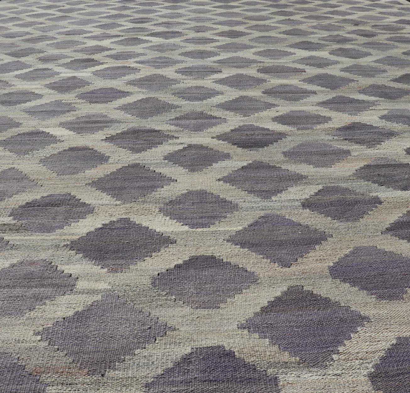 Modern Hand - Woven Flatweave Kilim in Wool with All - Over Geometric Diamond Design This flat - weave kilim has been hand - woven. The rug features a modern all - over geometric diamond design, rendered in shades of lavender, cream and brown; making this... - Keivan Woven ArtsAFG - 128 - 19694Rug