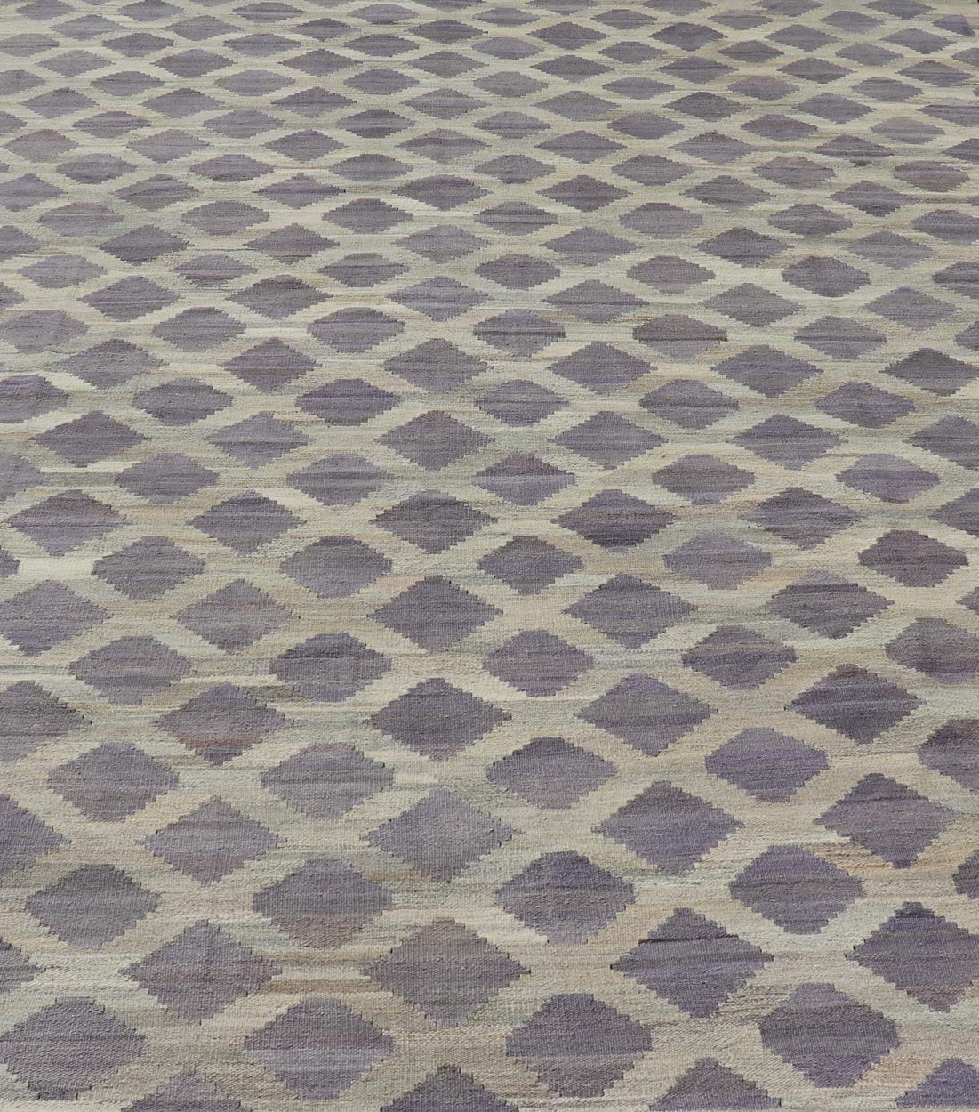 Modern Hand - Woven Flatweave Kilim in Wool with All - Over Geometric Diamond Design This flat - weave kilim has been hand - woven. The rug features a modern all - over geometric diamond design, rendered in shades of lavender, cream and brown; making this... - Keivan Woven ArtsAFG - 128 - 19694Rug