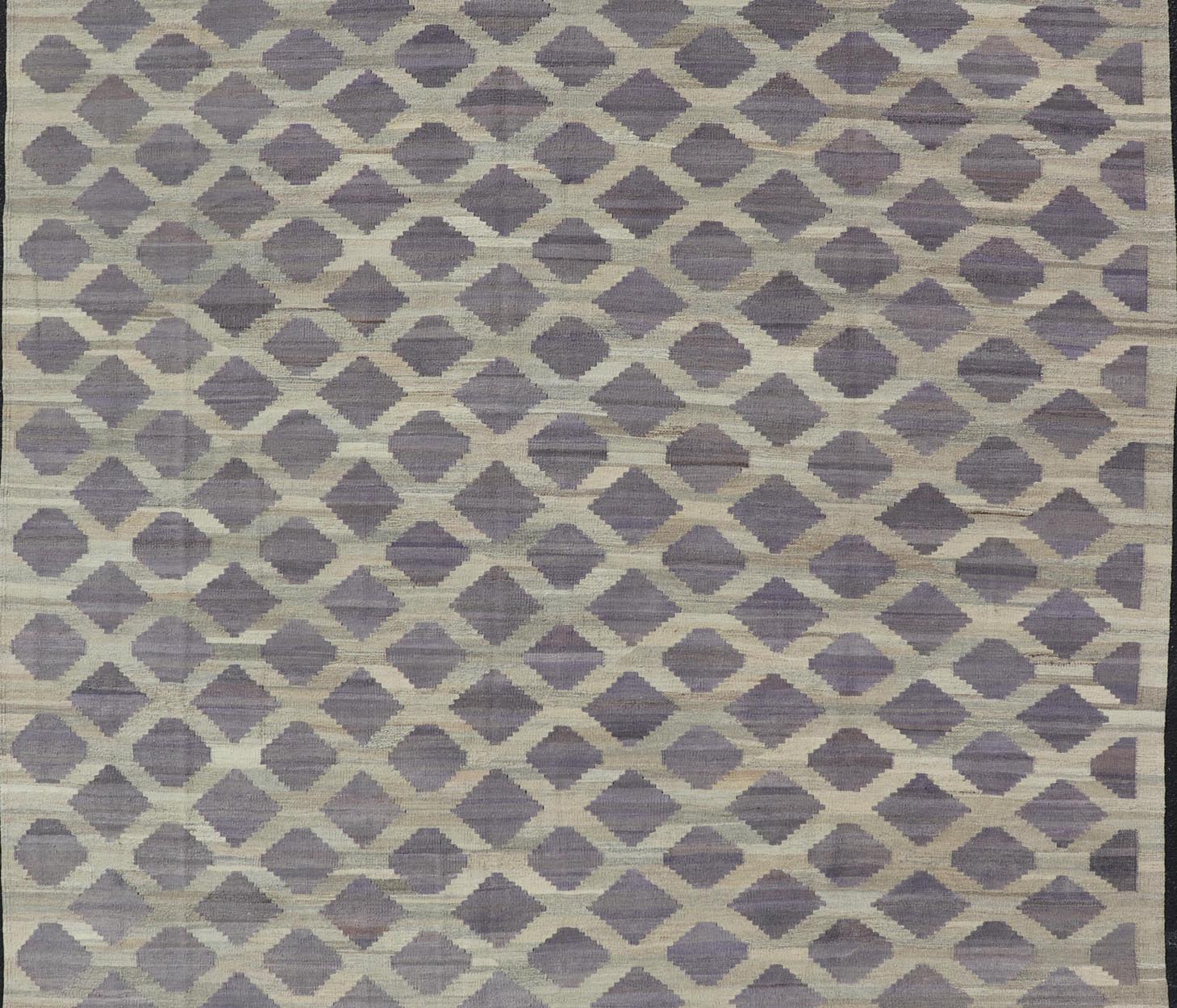 Modern Hand - Woven Flatweave Kilim in Wool with All - Over Geometric Diamond Design This flat - weave kilim has been hand - woven. The rug features a modern all - over geometric diamond design, rendered in shades of lavender, cream and brown; making this... - Keivan Woven ArtsAFG - 128 - 19694Rug