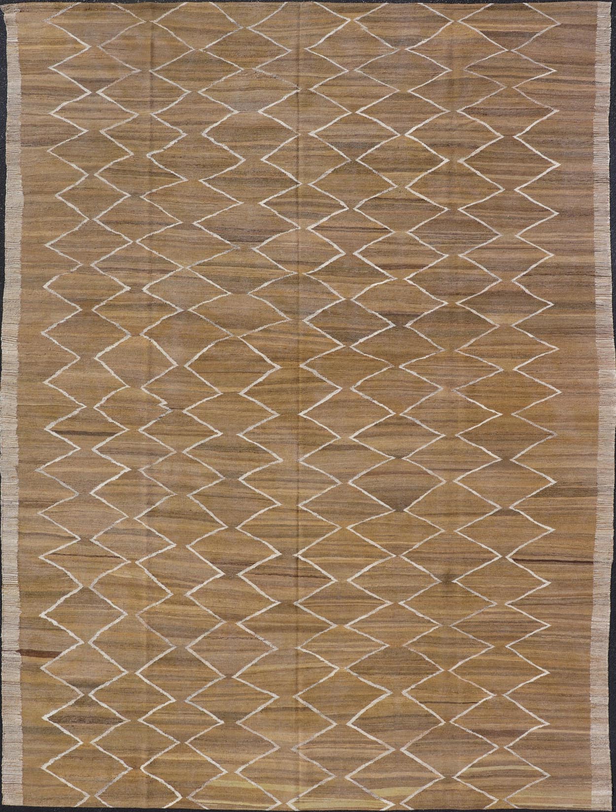 Hand - Woven Flatweave Kilim in Wool with Sub - Geometric Design in Marigold & Ivory This flat - weave kilim has been hand - woven. The rug features a modern diamond design, rendered in marigold, ivory and brown tones; making this rug a superb fit for a... - Keivan Woven ArtsAFG - 27588 - 19700Rug