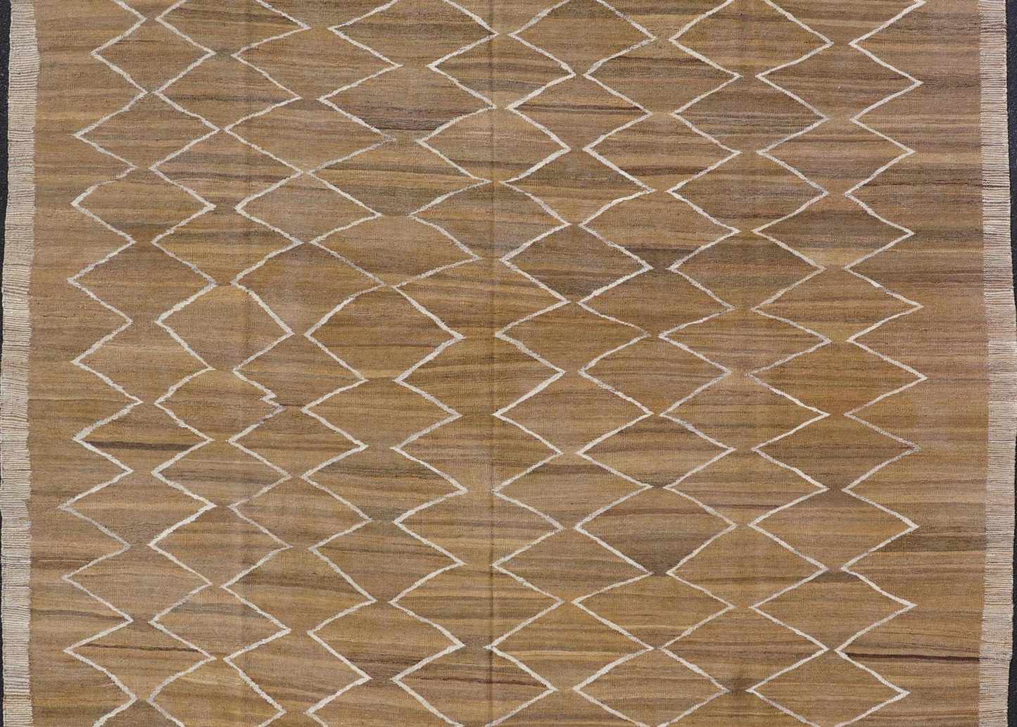 Hand - Woven Flatweave Kilim in Wool with Sub - Geometric Design in Marigold & Ivory This flat - weave kilim has been hand - woven. The rug features a modern diamond design, rendered in marigold, ivory and brown tones; making this rug a superb fit for a... - Keivan Woven ArtsAFG - 27588 - 19700Rug