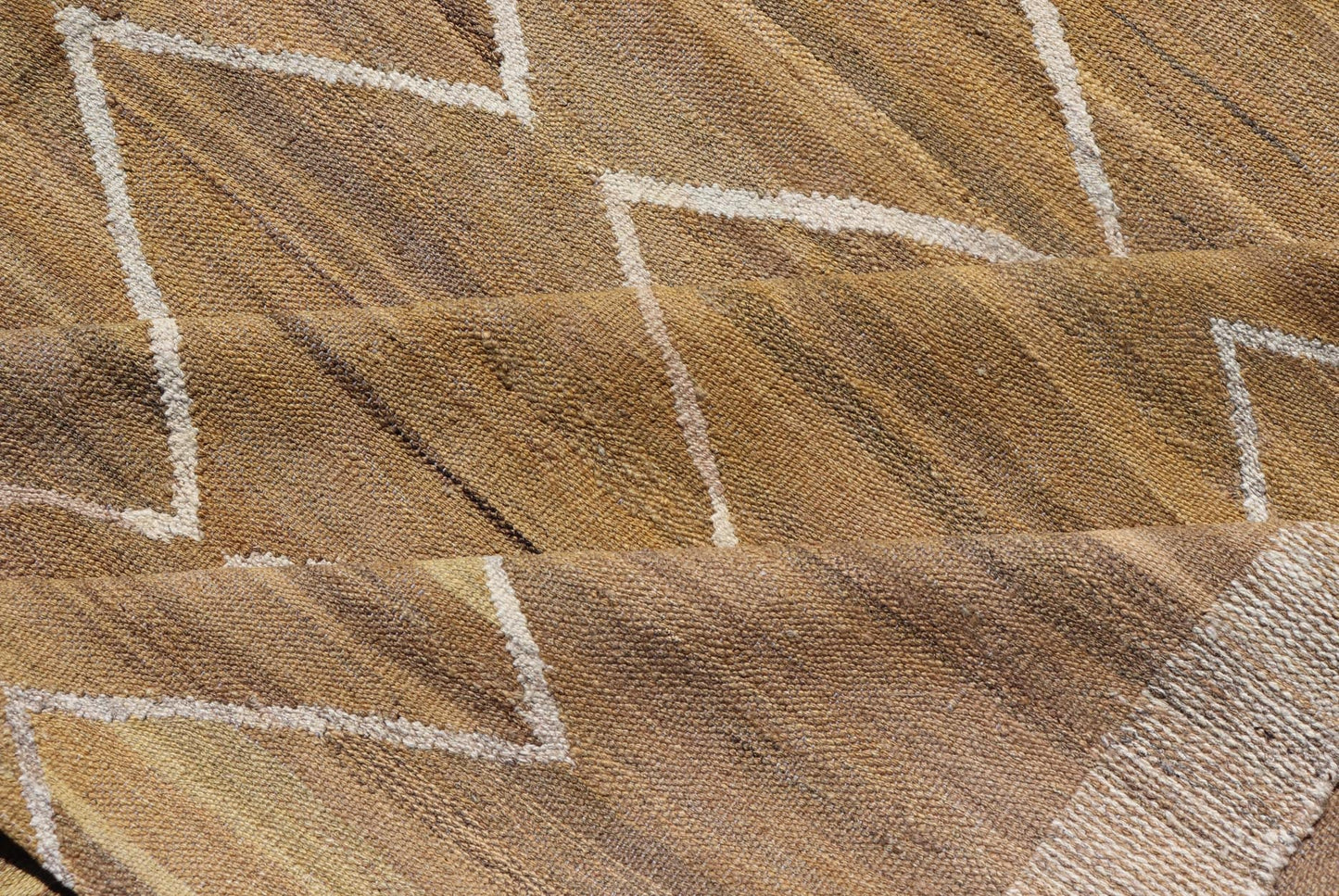 Hand - Woven Flatweave Kilim in Wool with Sub - Geometric Design in Marigold & Ivory This flat - weave kilim has been hand - woven. The rug features a modern diamond design, rendered in marigold, ivory and brown tones; making this rug a superb fit for a... - Keivan Woven ArtsAFG - 27588 - 19700Rug