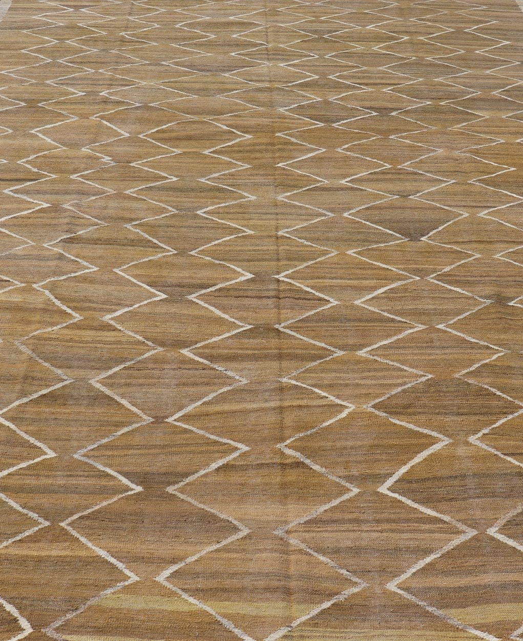 Hand - Woven Flatweave Kilim in Wool with Sub - Geometric Design in Marigold & Ivory This flat - weave kilim has been hand - woven. The rug features a modern diamond design, rendered in marigold, ivory and brown tones; making this rug a superb fit for a... - Keivan Woven ArtsAFG - 27588 - 19700Rug