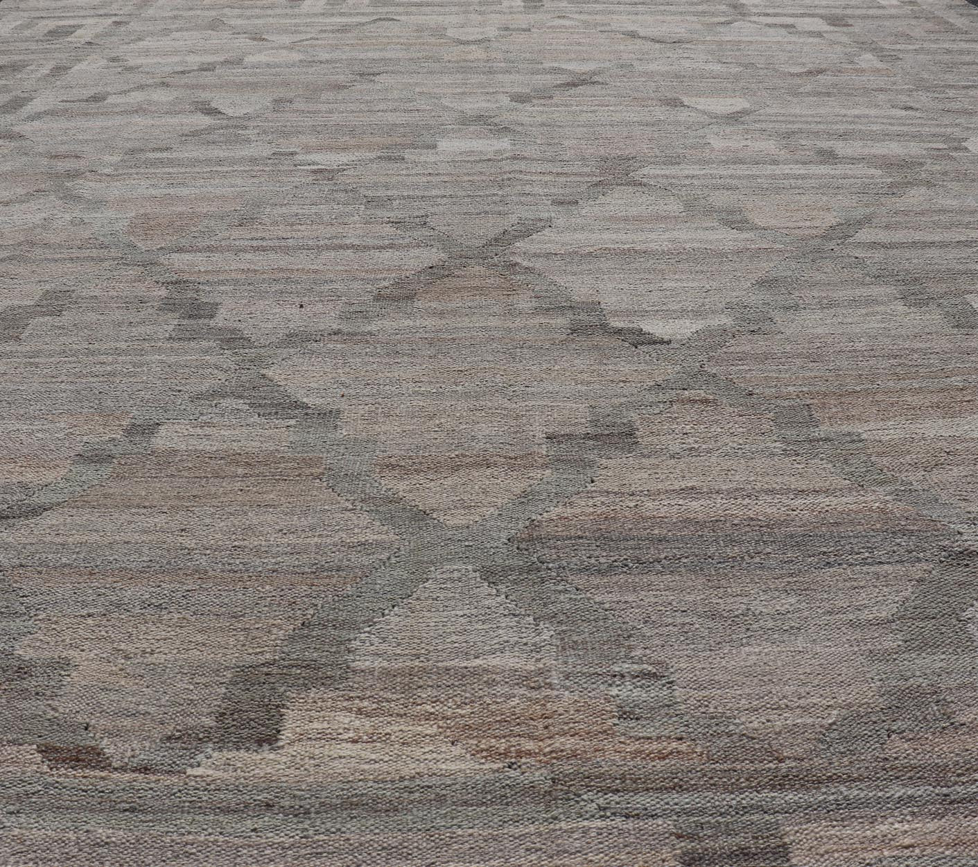 Modern Hand - Woven Kilim with Geometric Design and Greek Key Border in Wool This flat - weave tribal kilim has been hand - woven in wool. The rug features a modern geometric diamond design, enclosed within a Greek - key styled border, rendered in gray... - Keivan Woven ArtsAFG - 27637 - 19814Rug