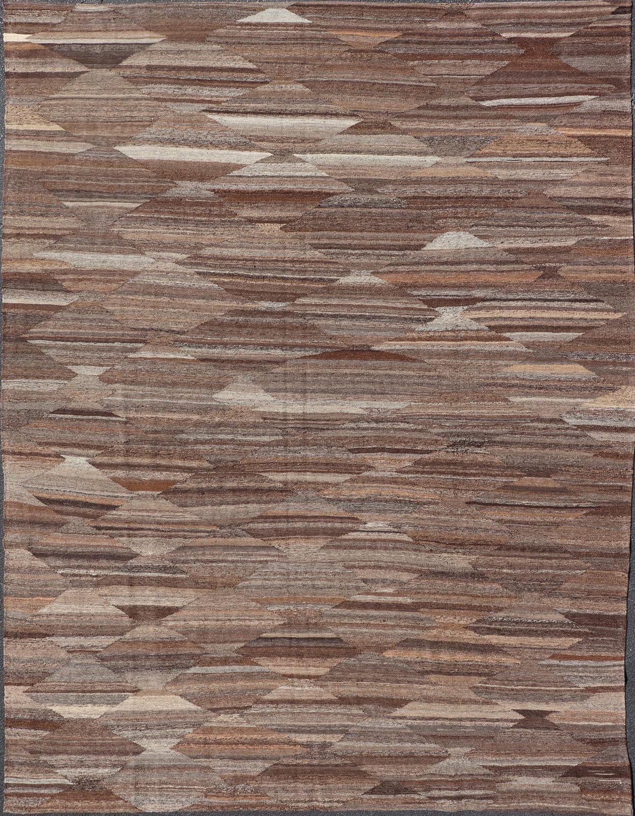 Modern Hand - Woven Flatweave Kilim in Wool with Sub - Geometric Diamond Design This flat - weave tribal kilim has been hand - woven. The rug features an all - over solid/diamond design, rendered in gray and earthy tones; making this rug a superb fit for... - Keivan Woven ArtsAFG - 27653 - 19724Rug