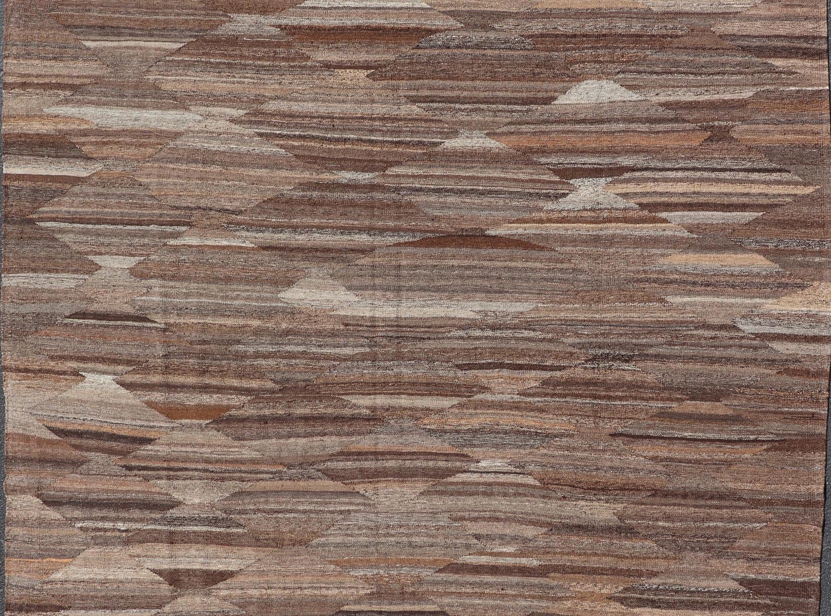 Modern Hand - Woven Flatweave Kilim in Wool with Sub - Geometric Diamond Design This flat - weave tribal kilim has been hand - woven. The rug features an all - over solid/diamond design, rendered in gray and earthy tones; making this rug a superb fit for... - Keivan Woven ArtsAFG - 27653 - 19724Rug