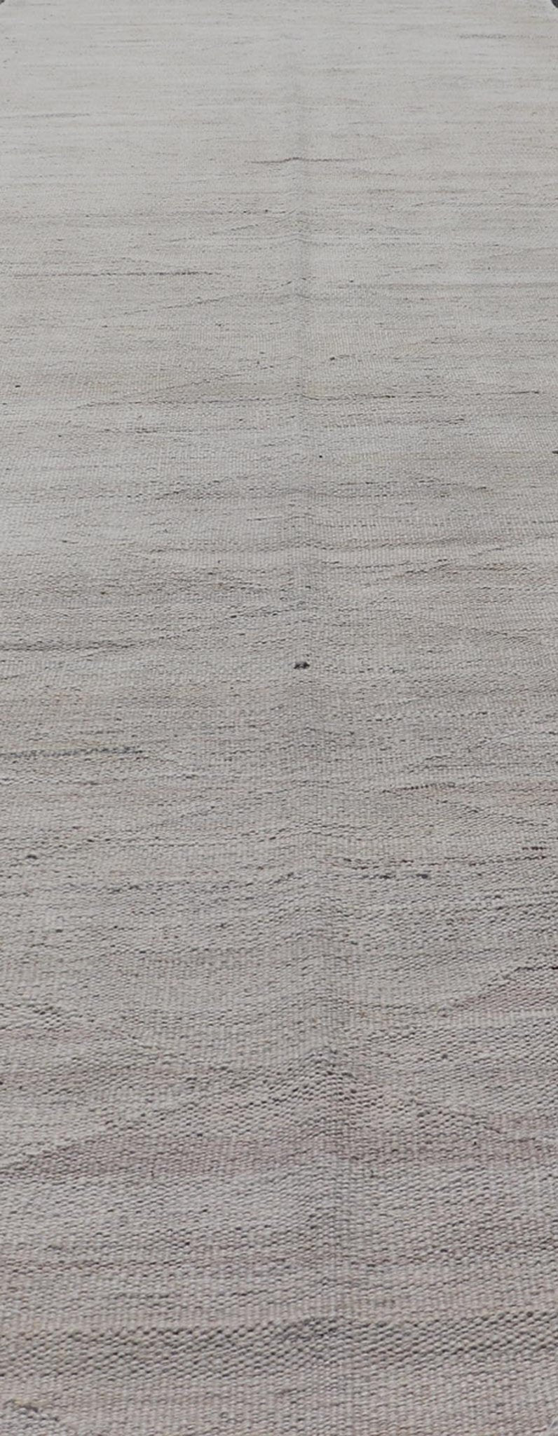 Modern Hand - Woven Gallery Runner Kilim in Wool with Geometric Diamond Design This flat - weave tribal kilim has been hand - woven in wool. The rug features a modern diamond design with horizontal lines, rendered in neutral tones; making this rug a... - Keivan Woven ArtsAFG - 29503 - 19820Rug