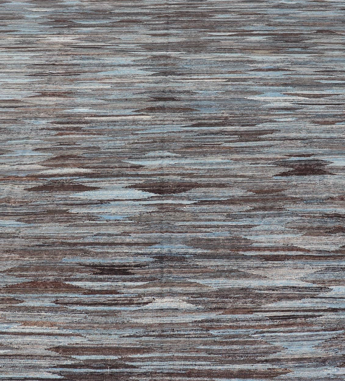Modern Flatweave Kilim in Wool With Sub - Geometric Diamond Design in Blue and Charcoal. This flat - weave kilim has been hand - woven. The rug features a modern all - over diamond design, rendered in blue and brown tones; making this rug a superb fit for ... - Keivan Woven ArtsAFG - 29504 - 19736Rug