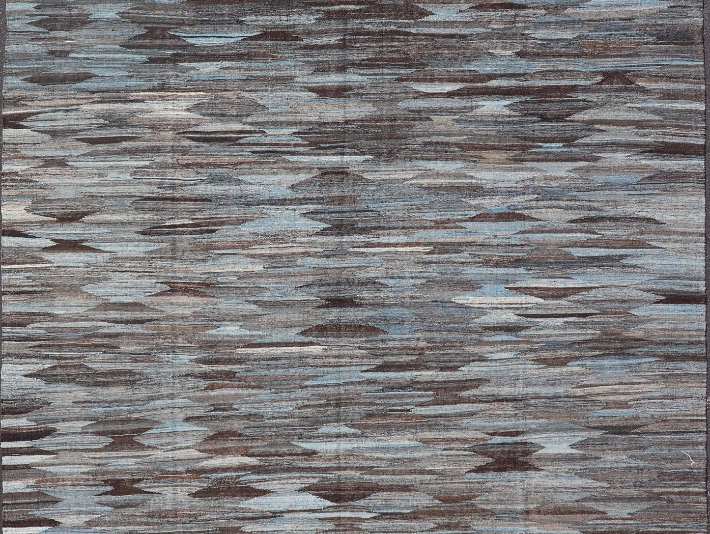 Modern Flatweave Kilim in Wool With Sub - Geometric Diamond Design in Blue and Charcoal. This flat - weave kilim has been hand - woven. The rug features a modern all - over diamond design, rendered in blue and brown tones; making this rug a superb fit for ... - Keivan Woven ArtsAFG - 29504 - 19736Rug