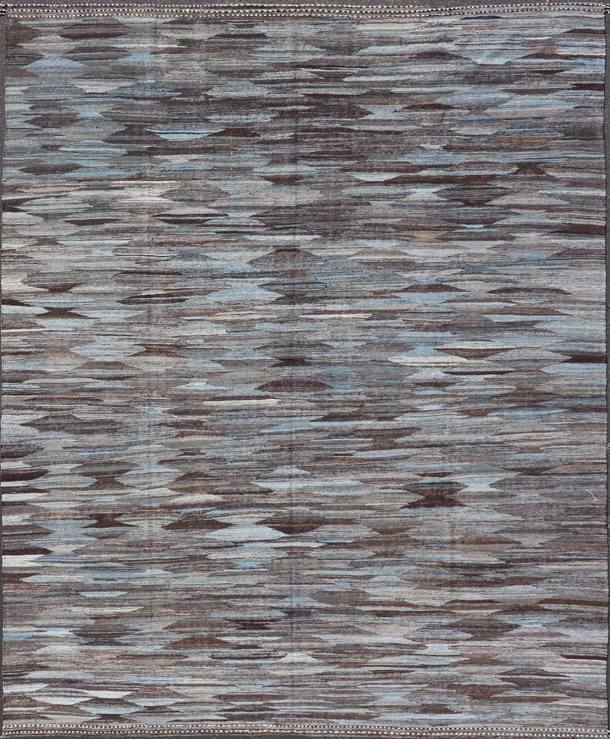 Modern Flatweave Kilim in Wool With Sub - Geometric Diamond Design in Blue and Charcoal. This flat - weave kilim has been hand - woven. The rug features a modern all - over diamond design, rendered in blue and brown tones; making this rug a superb fit for ... - Keivan Woven ArtsAFG - 29504 - 19736Rug