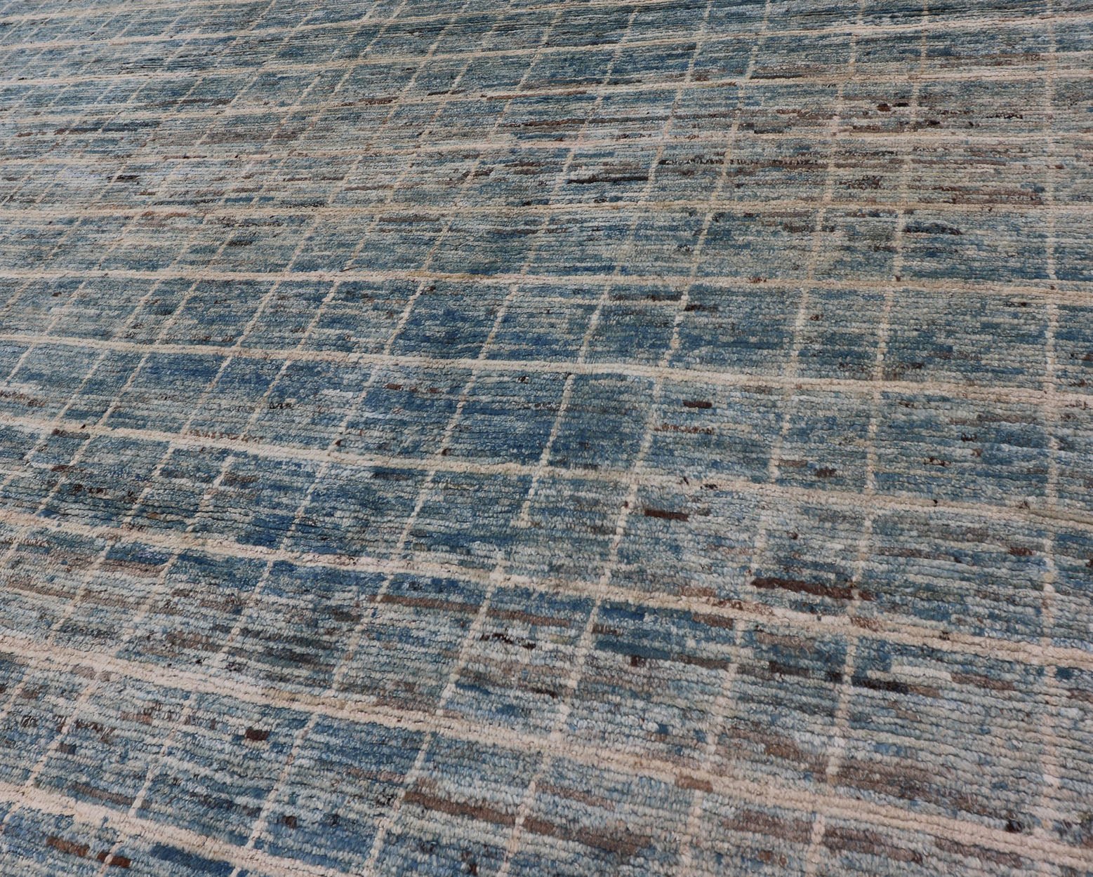 Modern Moroccan Rug by Keivan Woven Arts in Variegated Blue. Keivan Woven Arts rug AFG - 30606, country of origin / type: Afghanistan /Modern Casual. Measures: 9'6 x 11'8. This modern design and modern colored piled rug it a perfect option for mode... - Keivan Woven ArtsAFG - 30606 - 13984Rug