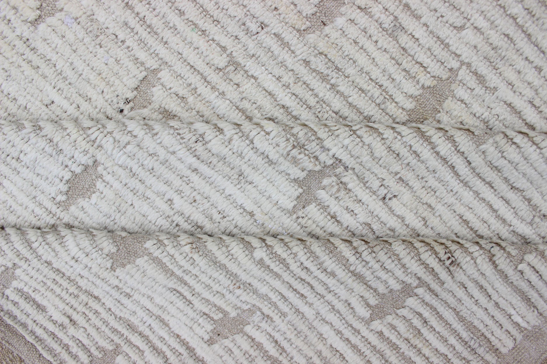 All - Over Modern Afghan in Shades of Cream Neutral tone rug with Moroccan free - flowing All - Over design, rug AFG - 33313, country of origin / type: Afghanistan The subdued design of this piled rug makes it perfect for modern and casual inter... - Keivan Woven ArtsAFG - 33313 - 13856Rug