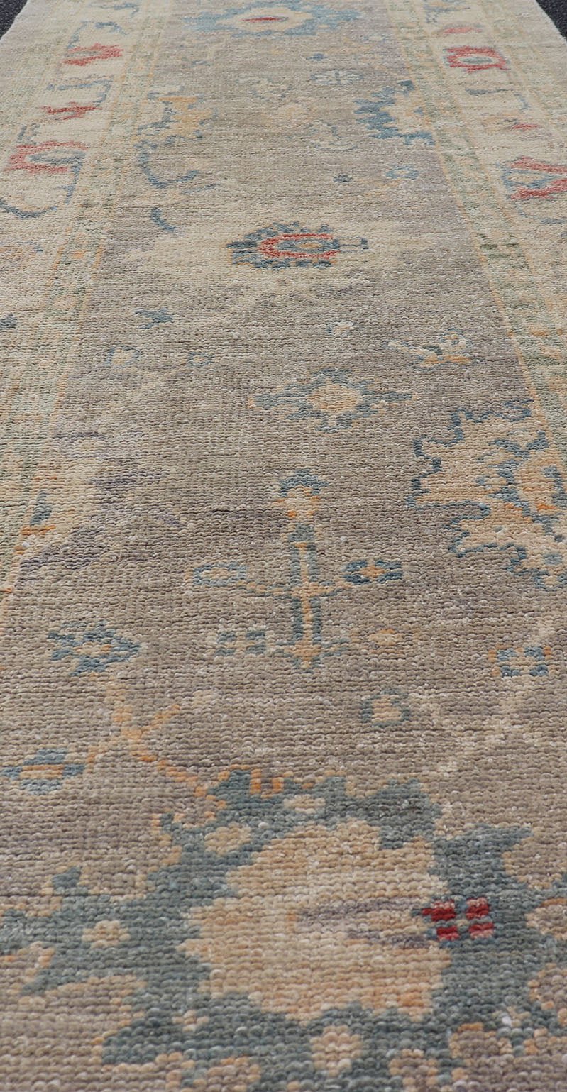 Measures: 2'11 x 9'2 Modern Oushak Floral Runner by Keivan Woven Arts in Multi Colors. Keivan Woven Arts/rug AFG - 39444, country of origin / type: Afghanistan / Oushak. This traditional Oushak rug features a neutral color background of taupe... - Keivan Woven ArtsAFG - 39444 - 18365Rug