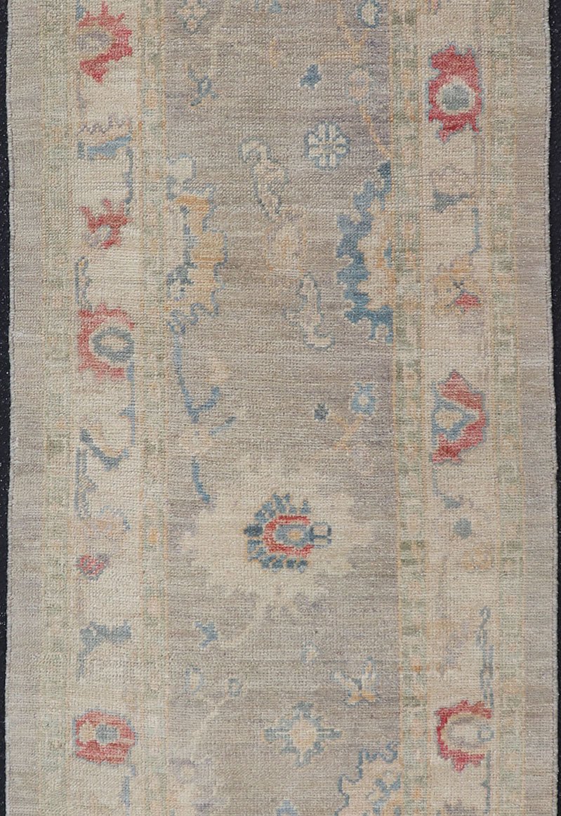 Measures: 2'11 x 9'2 Modern Oushak Floral Runner by Keivan Woven Arts in Multi Colors. Keivan Woven Arts/rug AFG - 39444, country of origin / type: Afghanistan / Oushak. This traditional Oushak rug features a neutral color background of taupe... - Keivan Woven ArtsAFG - 39444 - 18365Rug