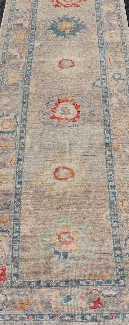 Measures: 3'0 x 9'6 Modern Floral Oushak Runner in Multi Colors by Keivan Woven Arts. Keivan Woven Arts/rug AFG - 39458, country of origin / type: Afghanistan / Oushak. This traditional Oushak rug features a neutral color background of taupe ... - Keivan Woven ArtsAFG - 39458 - 18251Rug
