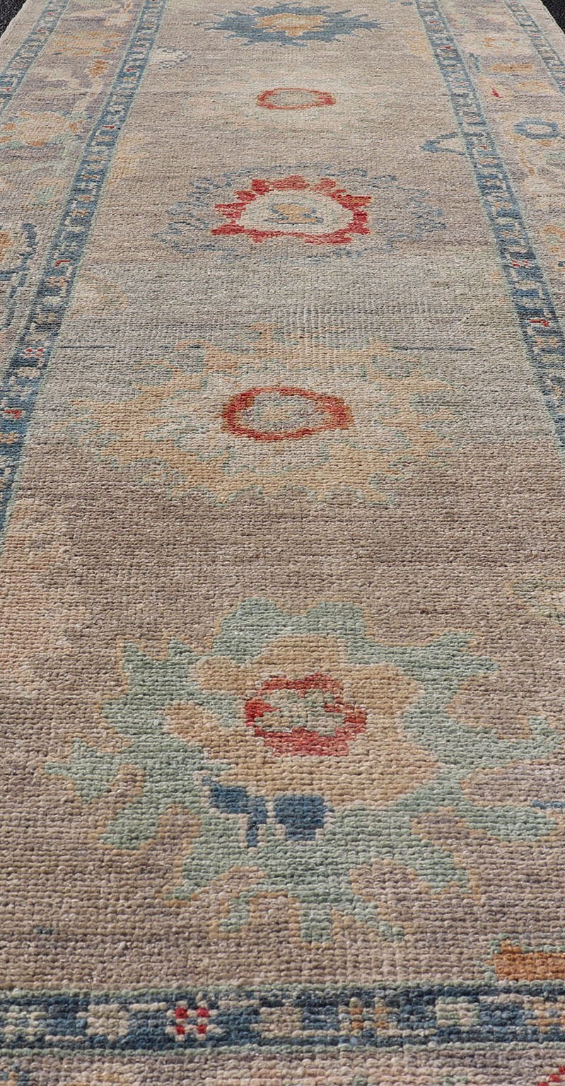 Measures: 3'0 x 9'6 Modern Floral Oushak Runner in Multi Colors by Keivan Woven Arts. Keivan Woven Arts/rug AFG - 39458, country of origin / type: Afghanistan / Oushak. This traditional Oushak rug features a neutral color background of taupe ... - Keivan Woven ArtsAFG - 39458 - 18251Rug