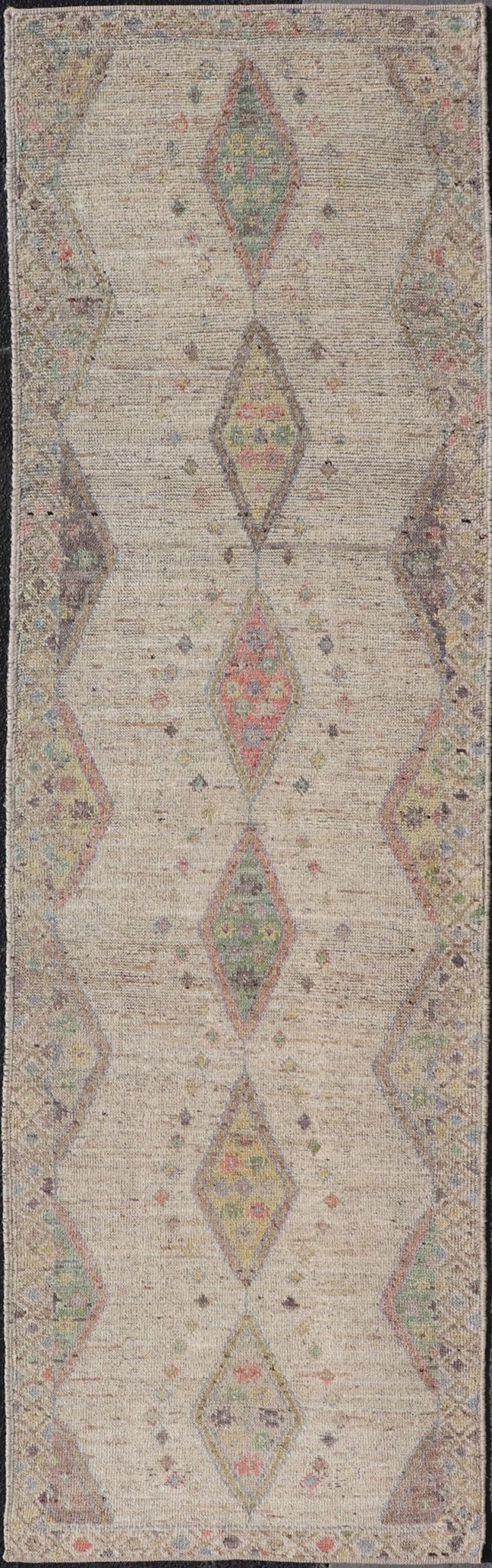 Modern Hand - Knotted Runner with Sub - Geometric Diamond Design in Wool This modern casual tribal rug has been hand - knotted in wool. The rug features a modern sub - geometric diamond design, rendered in multicolor, and enclosed within a complemen... - Keivan Woven ArtsAFG - 39502 - 19754Rug