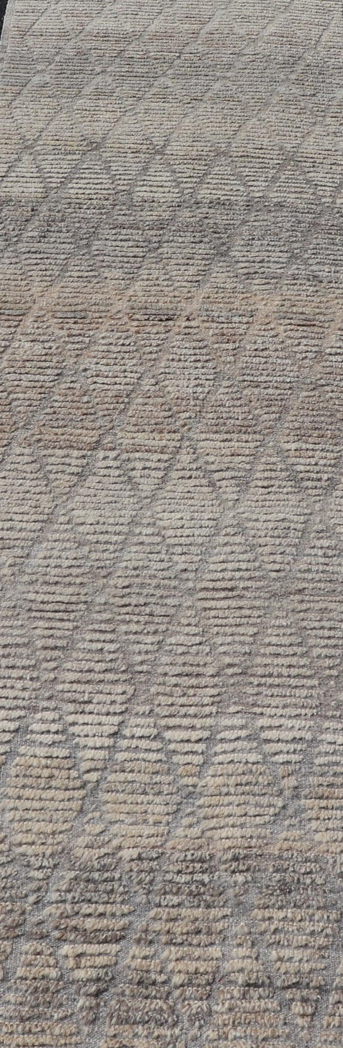 Modern Hand - Knotted Moroccan Rug with Diamond Design in Gray and Neutral Tones This modern casual tribal rug has been hand - knotted in wool. The rug features a modern geometric diamond design, rendered in gray and neutral tones, making this rug ... - Keivan Woven ArtsAFG - 39540 - 19760Rug