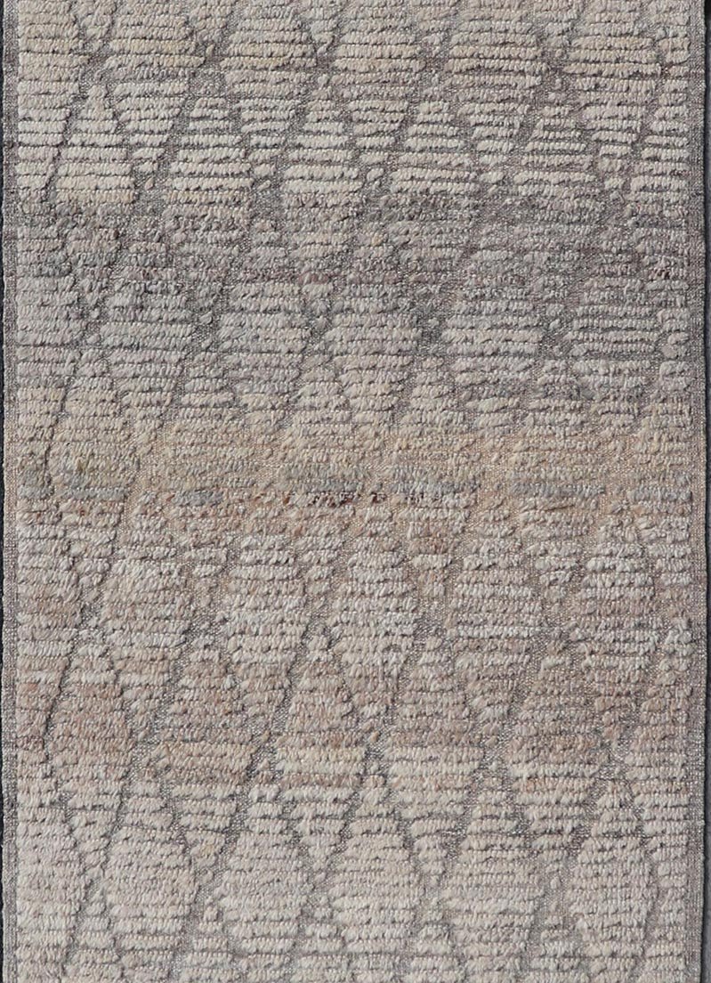 Modern Hand - Knotted Moroccan Rug with Diamond Design in Gray and Neutral Tones This modern casual tribal rug has been hand - knotted in wool. The rug features a modern geometric diamond design, rendered in gray and neutral tones, making this rug ... - Keivan Woven ArtsAFG - 39540 - 19760Rug